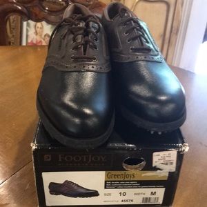 Black and brown golf shoes